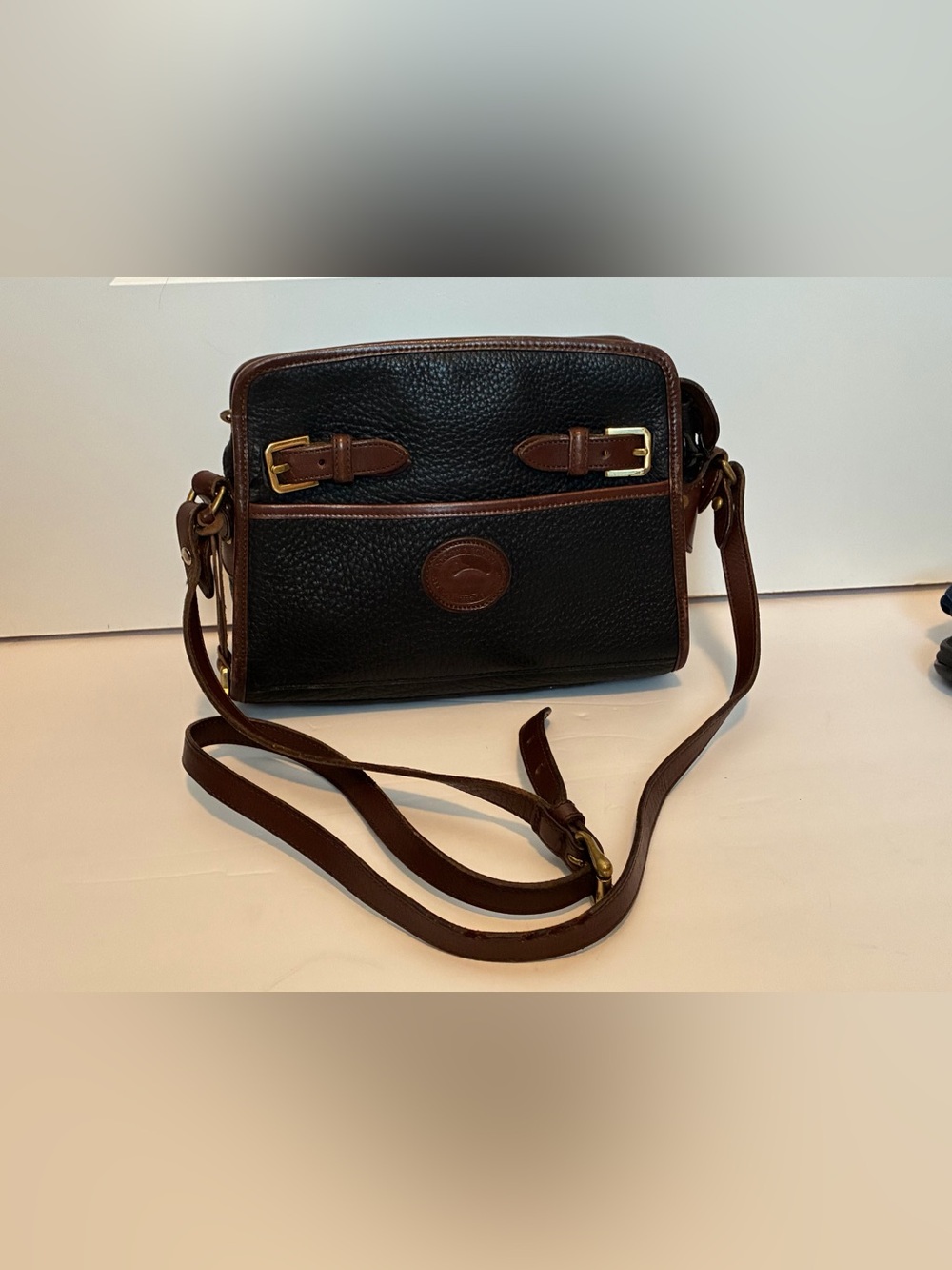 Vintage Dooney & Bourke Black Pebbled Leather Crossbody with Brown Trim
